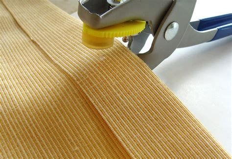 add metal snaps to fabric|inserting metal snaps in fabric.